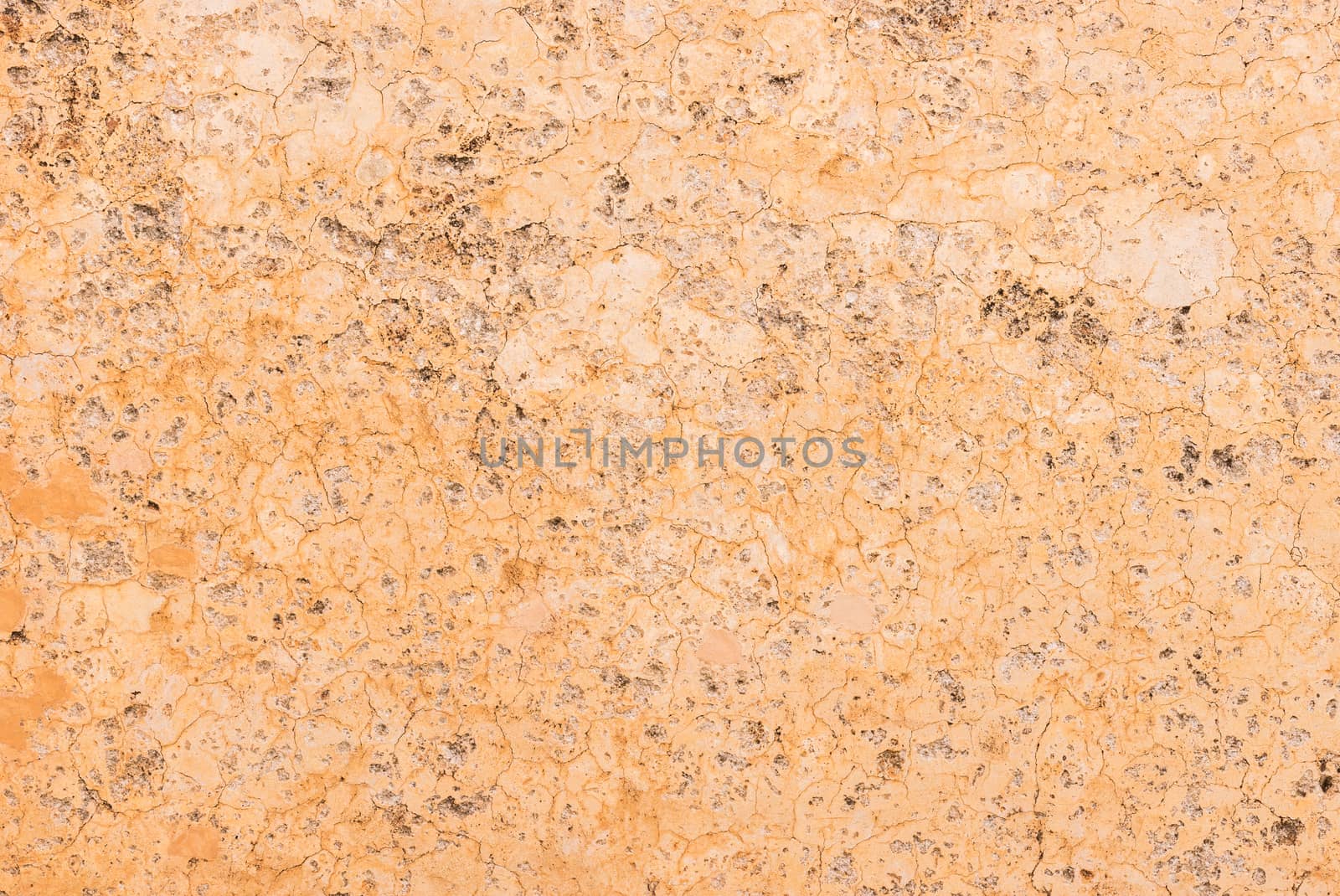 Vintage colored wall background with rustic weathered plaster texture