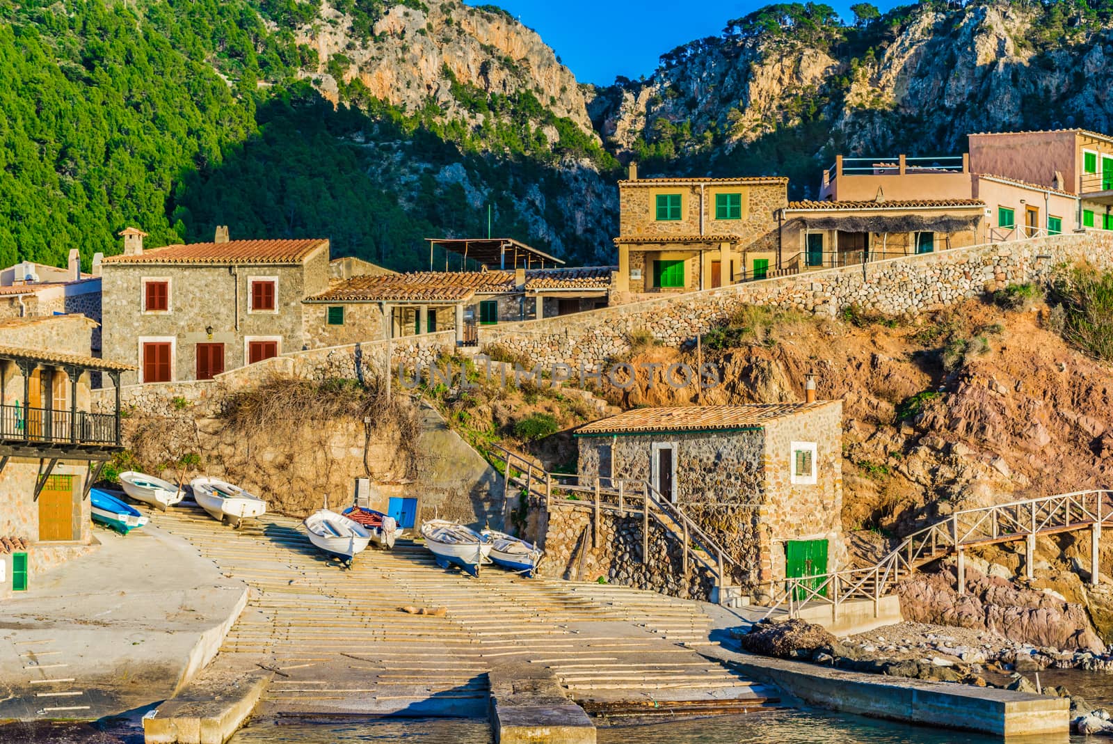 Idyllic view of the romantic old harbor of the fishing village Valldemossa on Mallorca, Spain Balearic islands