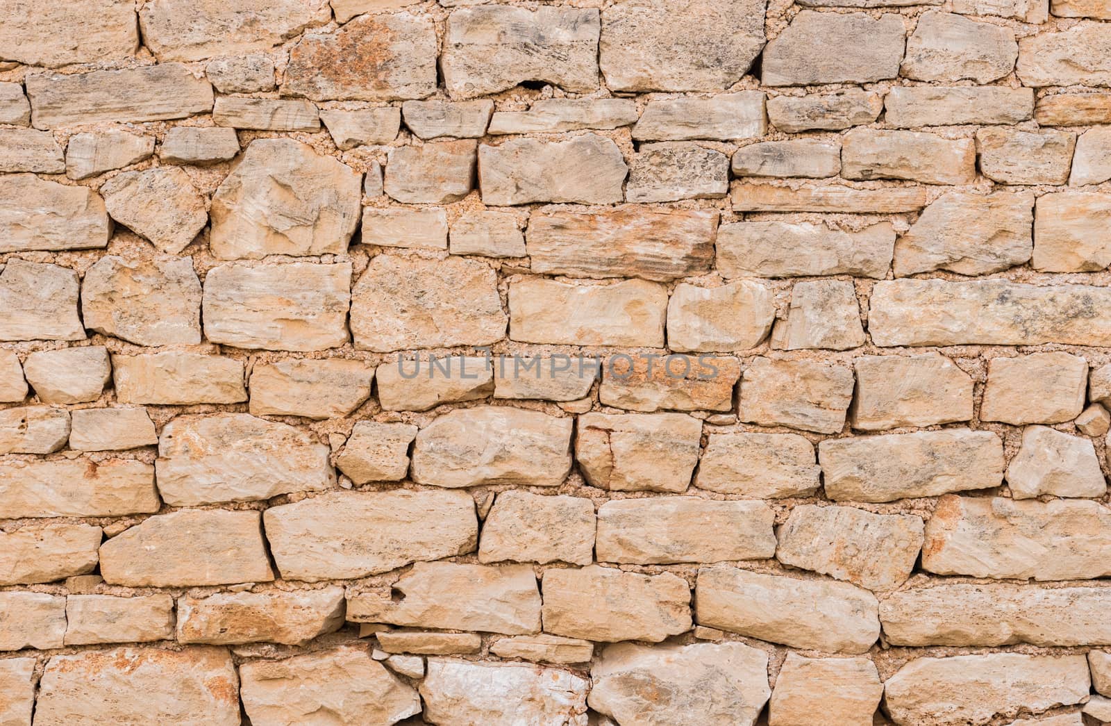 Natural vintage stone wall background texture, close-up