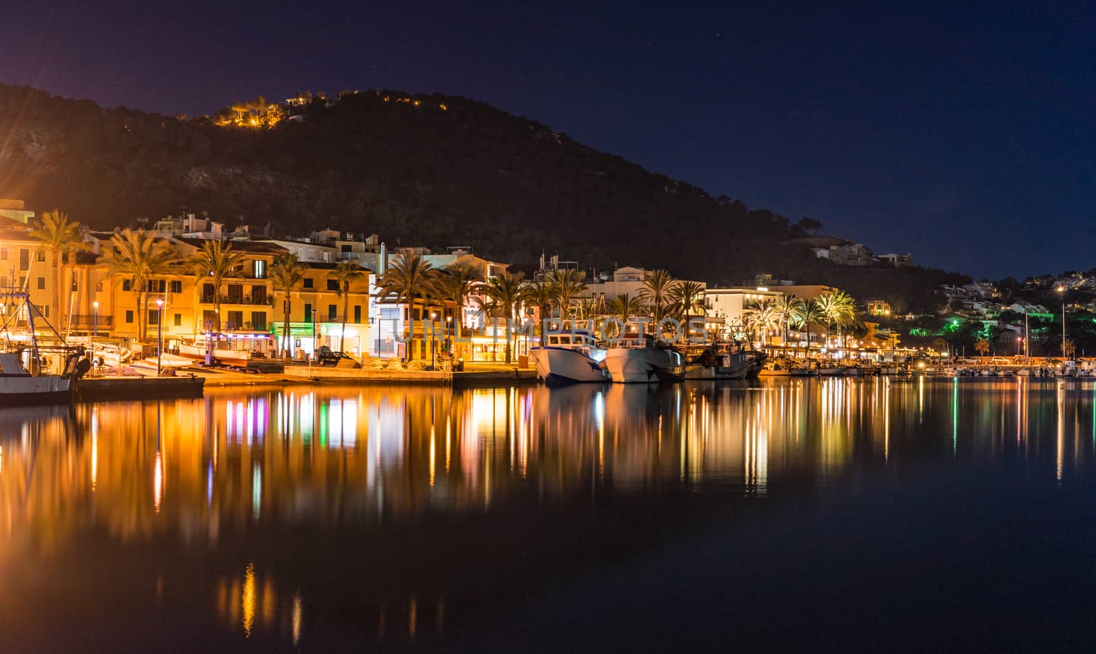 Idyllic view of the illuminated waterfront of Port de Andratx on Mallorca island at night