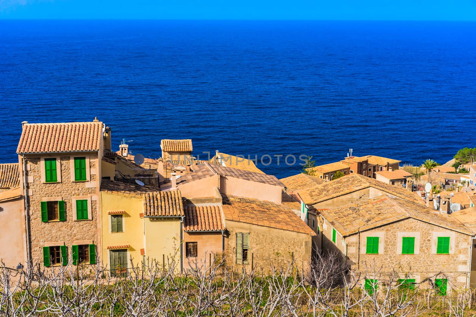 Old traditional village Banyalbufar at the coast on Mallorca island, Spain Mediterranean sea