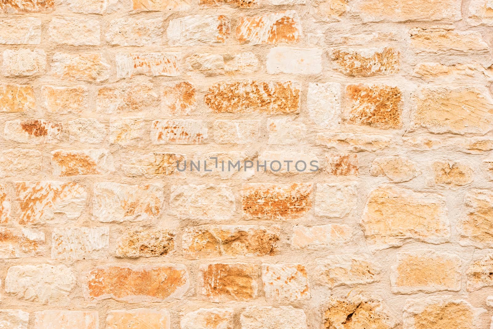 Rustic brown stone wall texture background structure