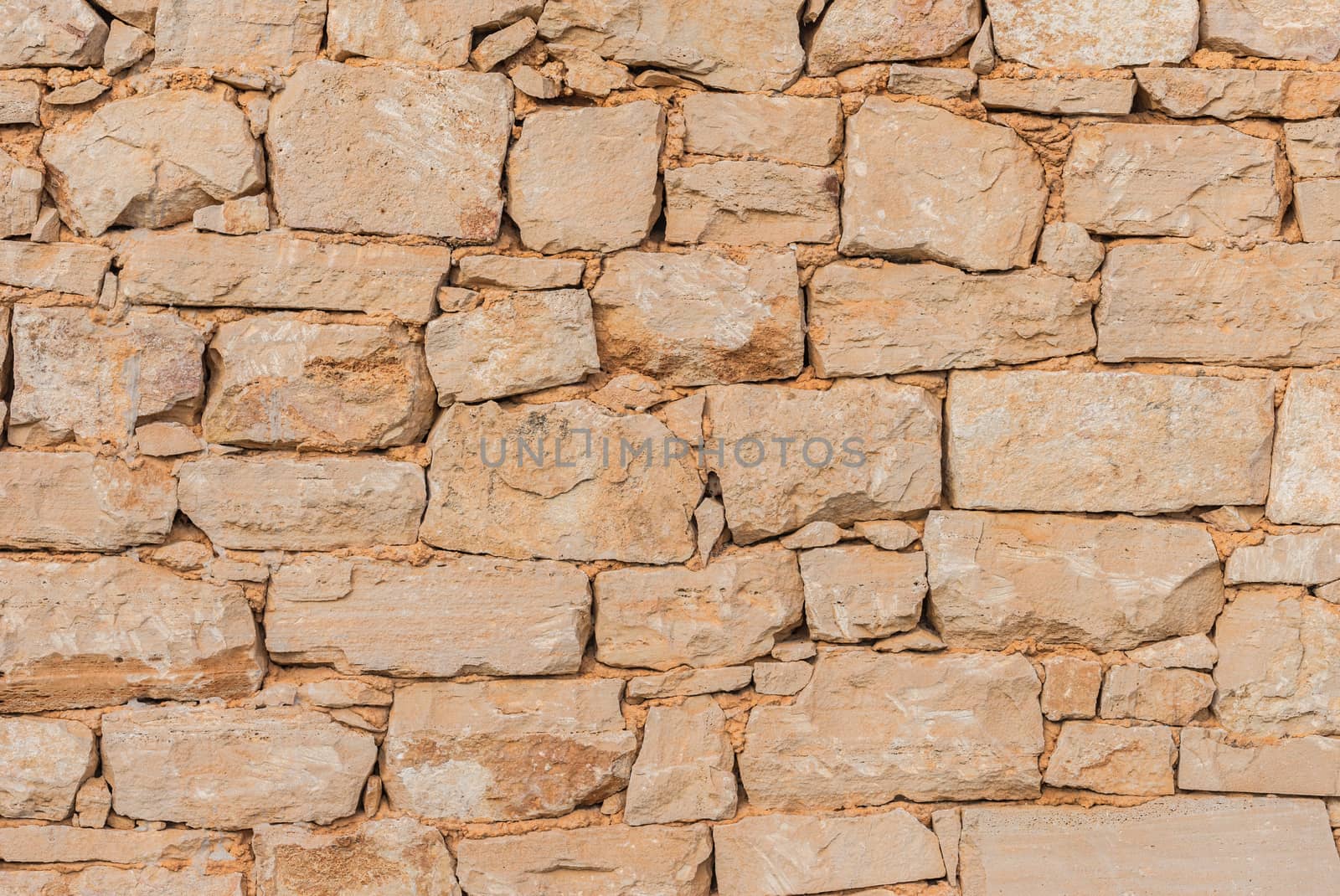 Vintage gray stone wall background texture, close-up