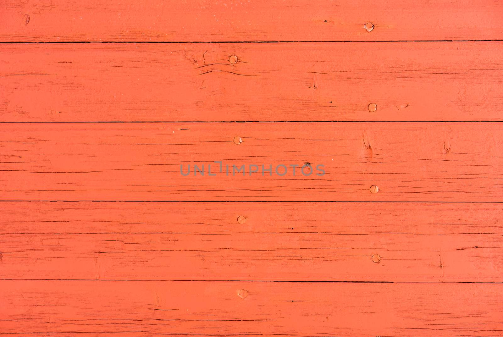 Red colored wooden planks background with copy space