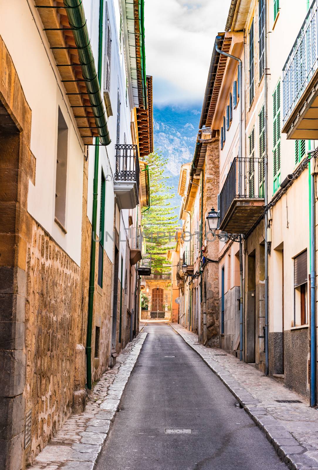 View of an narrow street at the old town of Soller on Majorca island, Spain