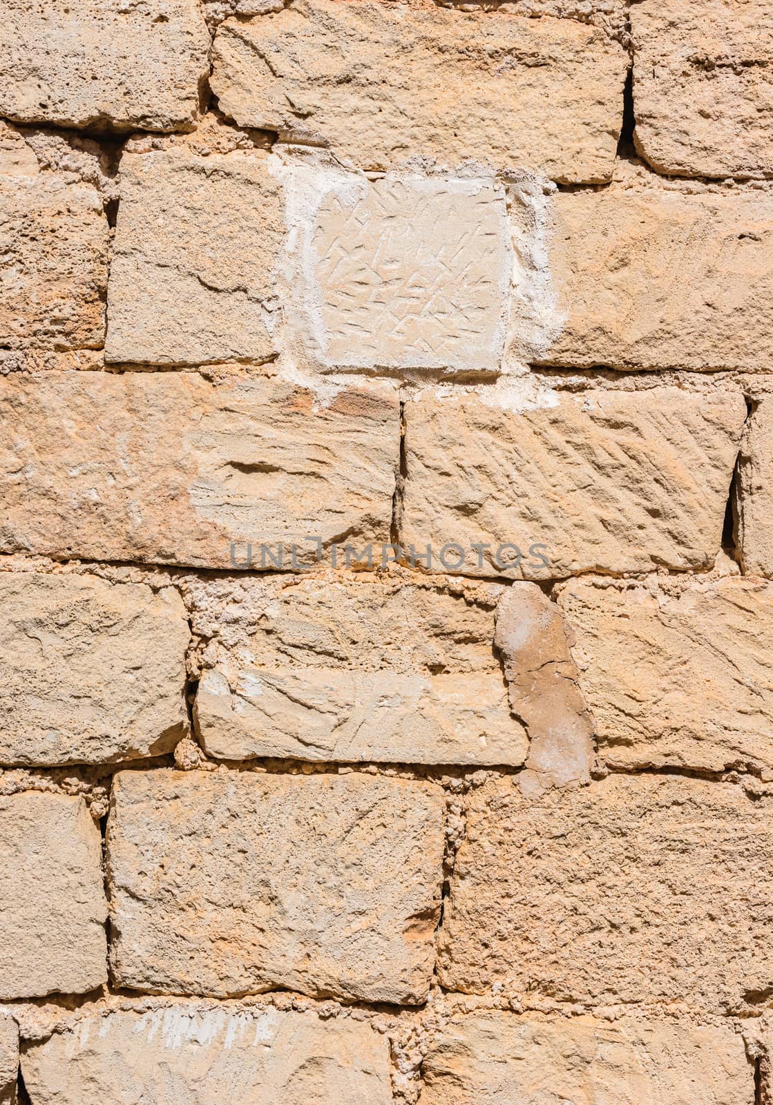 Vintage rustic stone wall backdrop texture, close-up