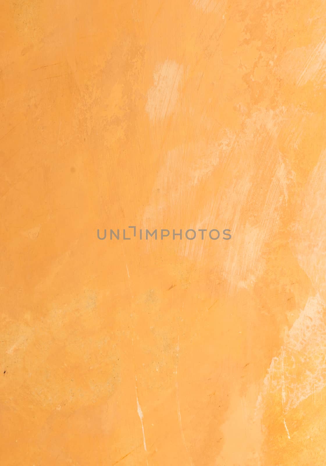 Vintage colored wall background with rustic weathered plaster texture