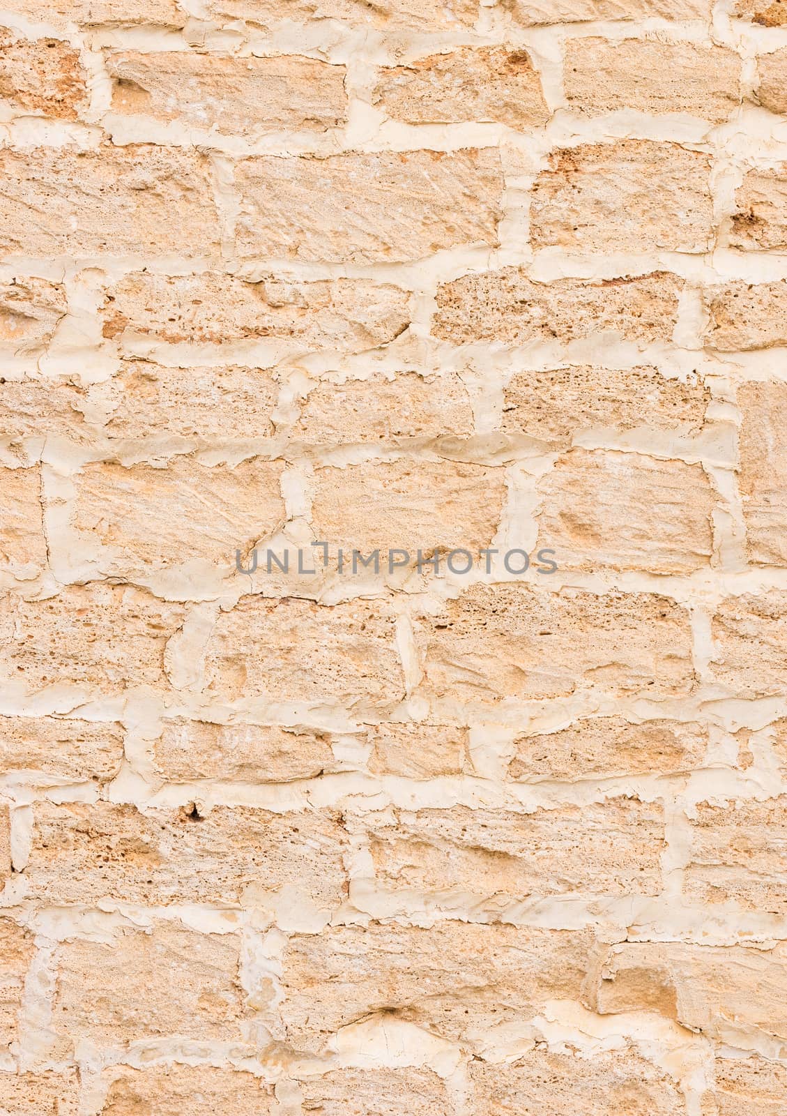 Rustic old stone wall texture background structure