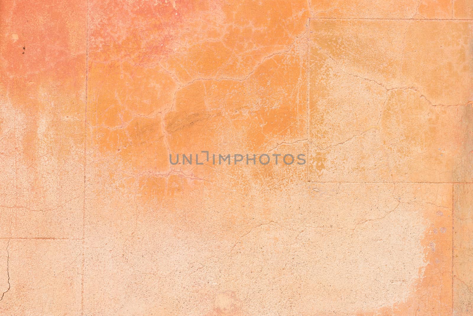 Vintage colored wall background with rustic weathered plaster texture