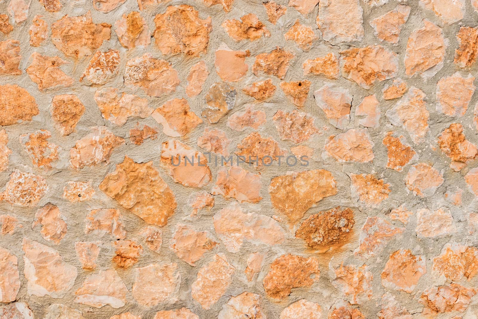 Natural vintage stone wall background texture, close-up