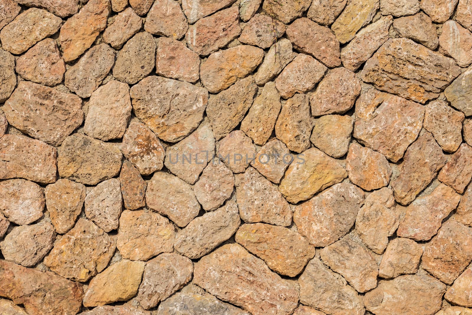 Stone wall background texture, structure close-up