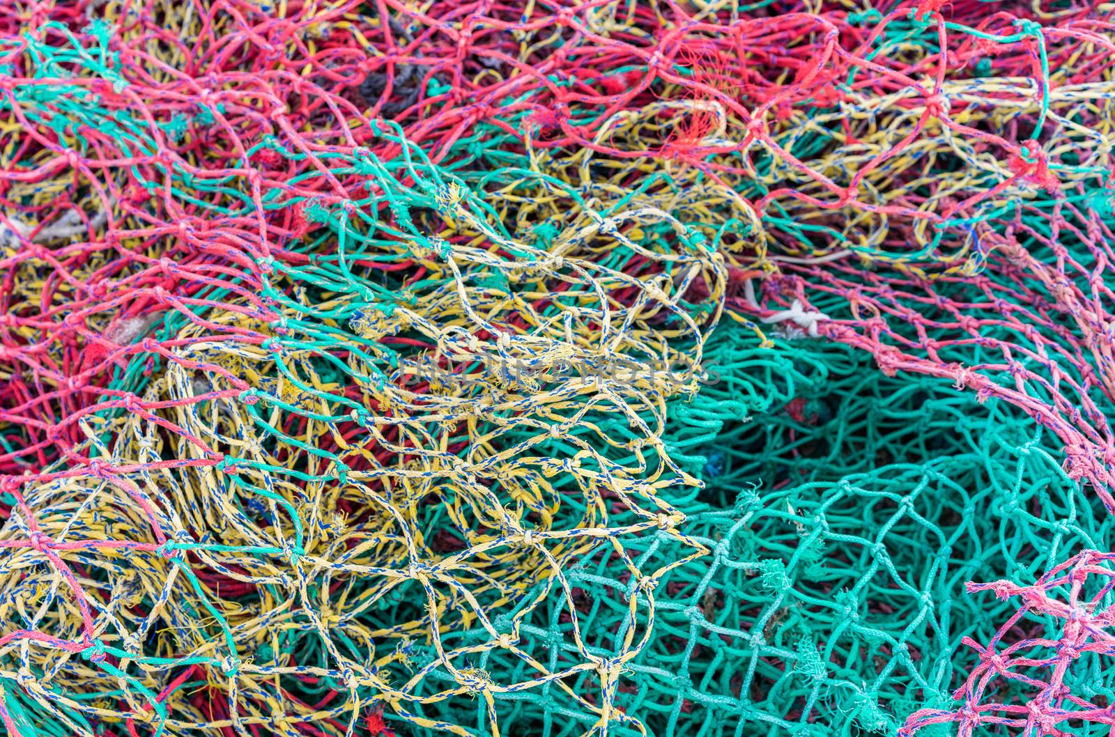 Close-up of mulit-colored fishing nets pattern background 