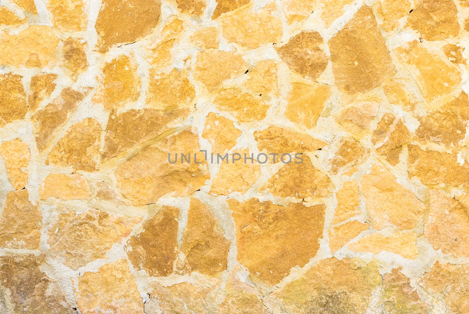Rustic brown stone wall texture background structure