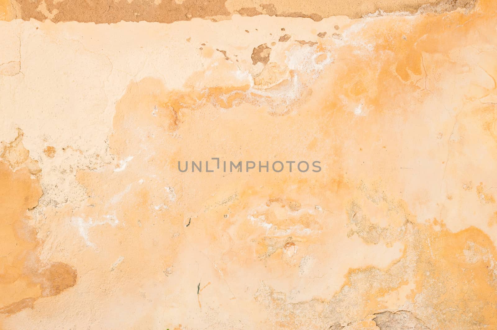 Old rustic damaged plaster wall backdrop texture, close-up