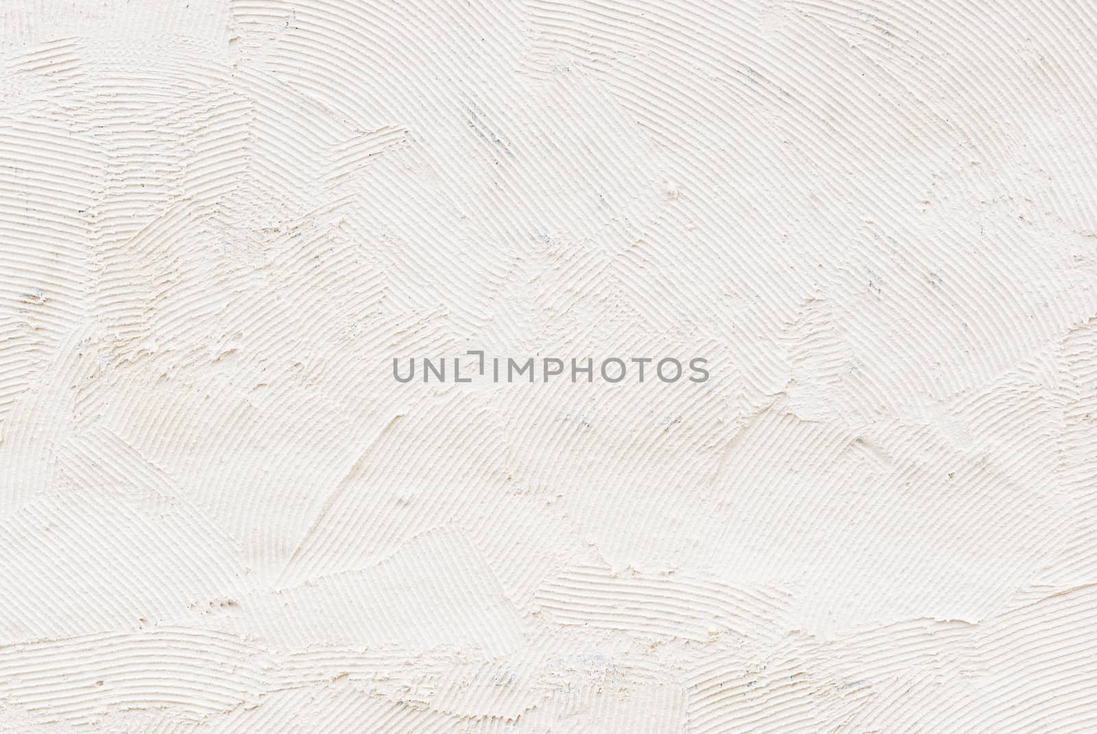 White wall raw plastered background texture with copy space