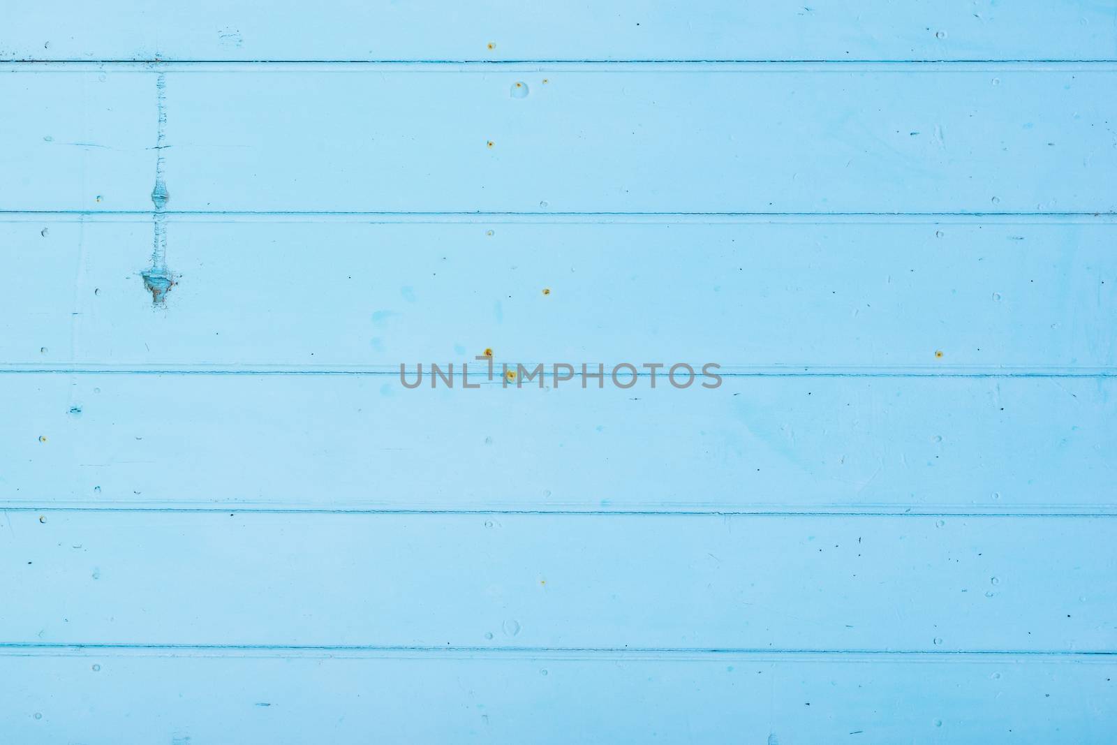Light blue painted wooden planks background texture with copy space