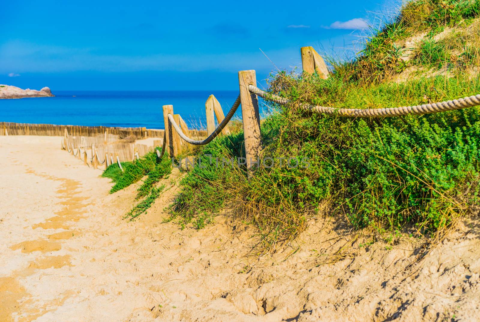 Sand dunes at the beach of Cala Agulla in Cala Rajada on Majorca island, Spain Mediterranean Sea