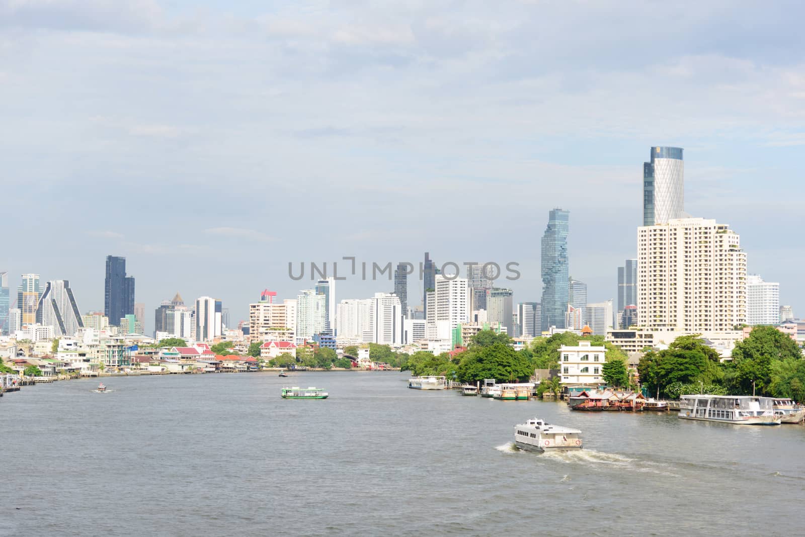 Bangkok , Thailand - 1 July, 2020: high building at the river