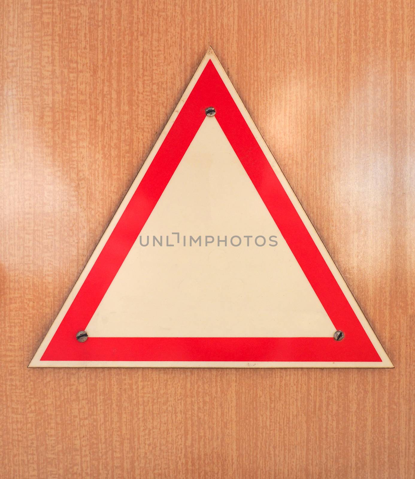 Blank road sign with copy space for your own message. Danger sign with wooden background