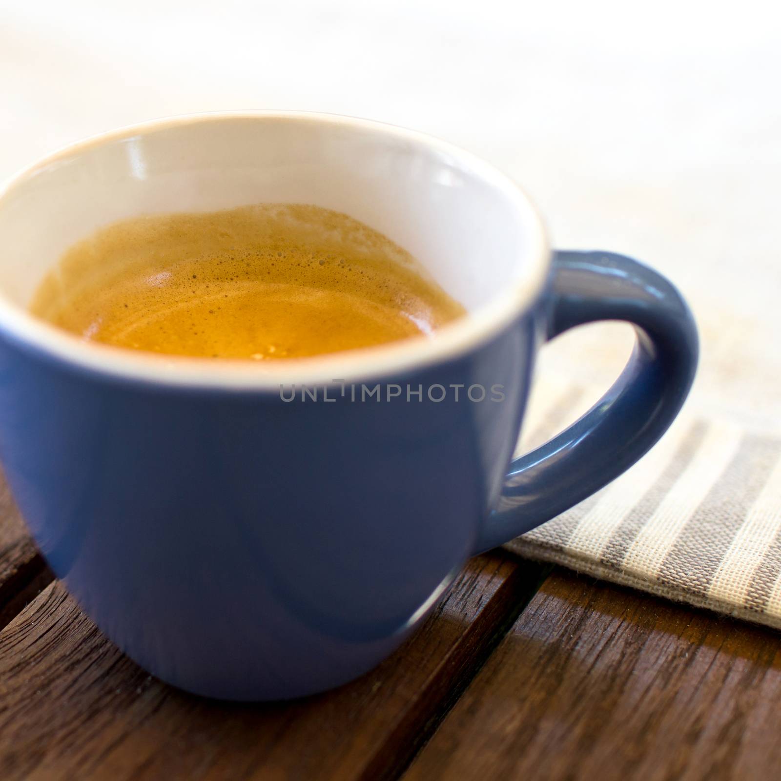 Coffee cup on wooden tables.