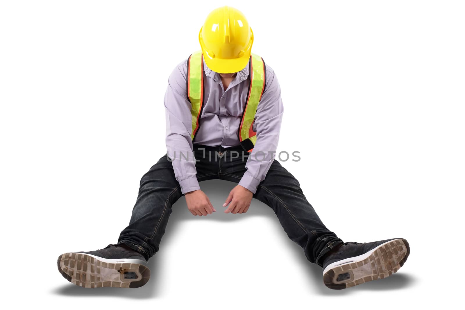 a man just lost his job sitting on the floor with his head down feeling depressed