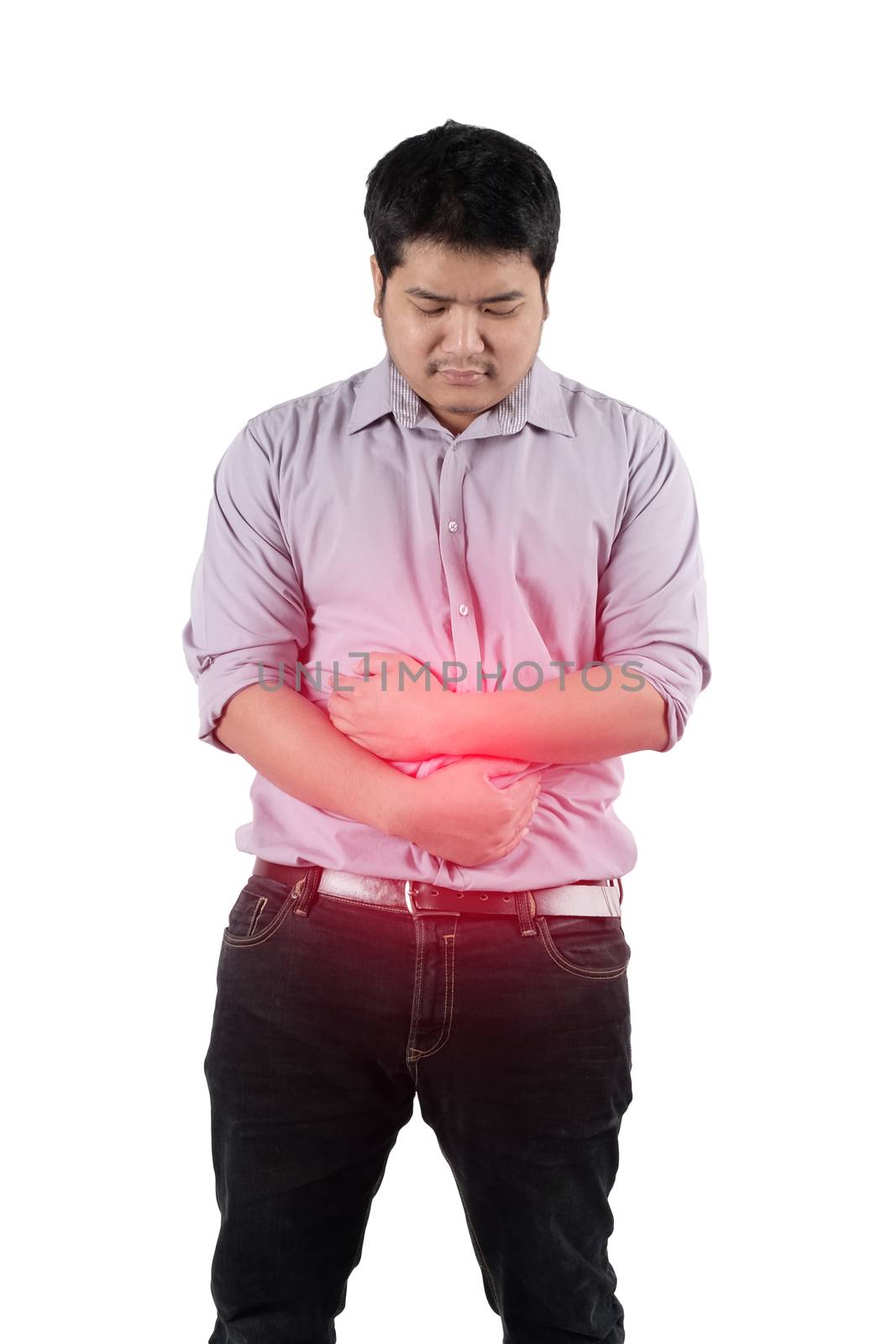 a man holding his hands over the lower abdominal because of suff by Surasak
