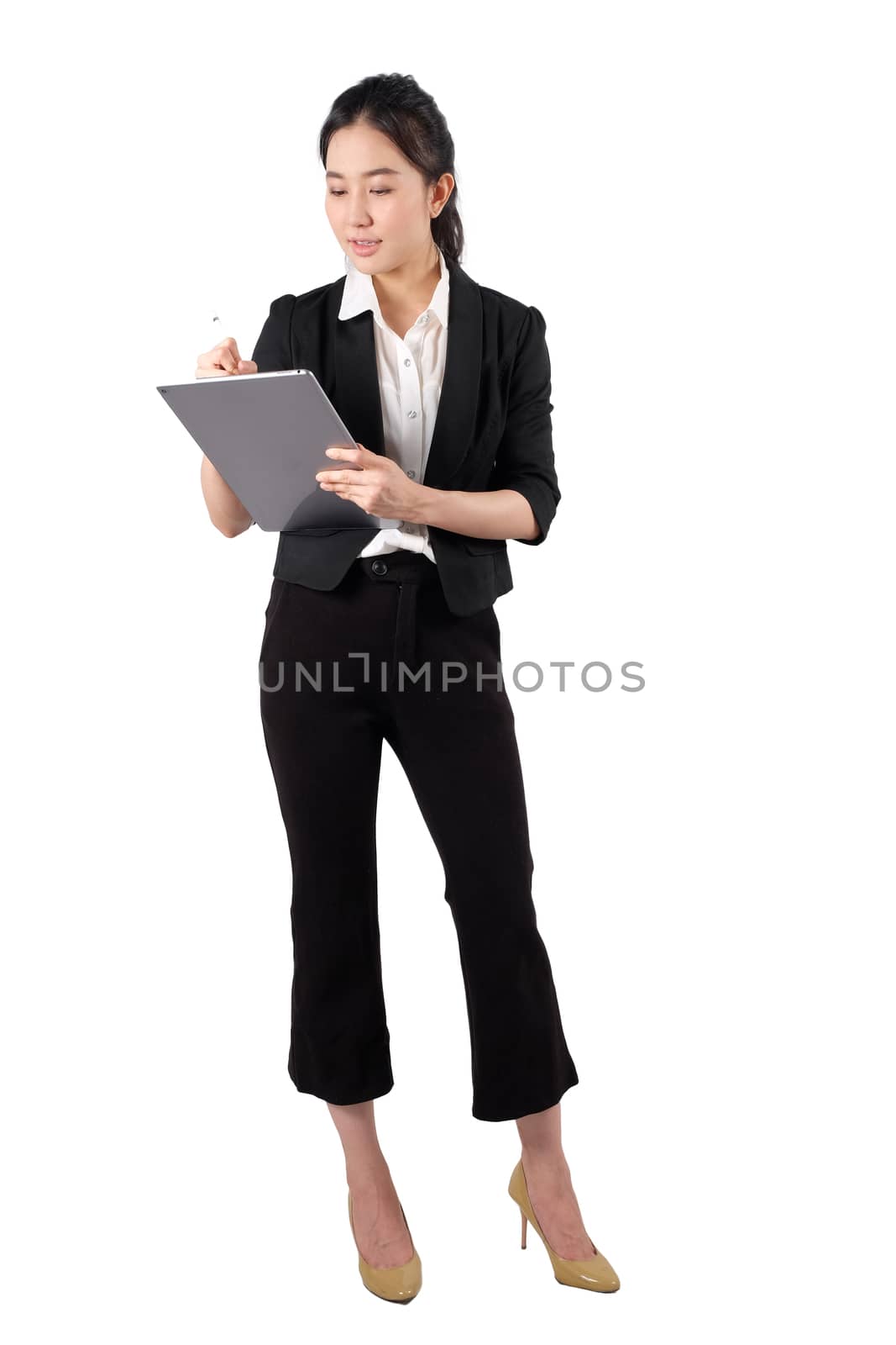 young working woman holding digital tablet on white background by Surasak