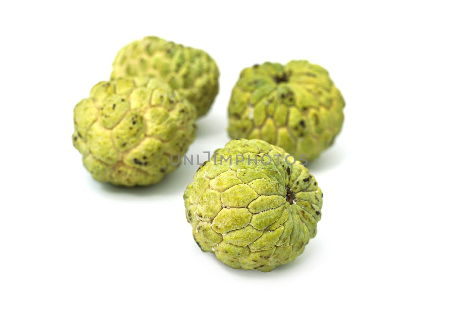 Closed up shot Fresh from nature organic Sugar apple isolated on white.