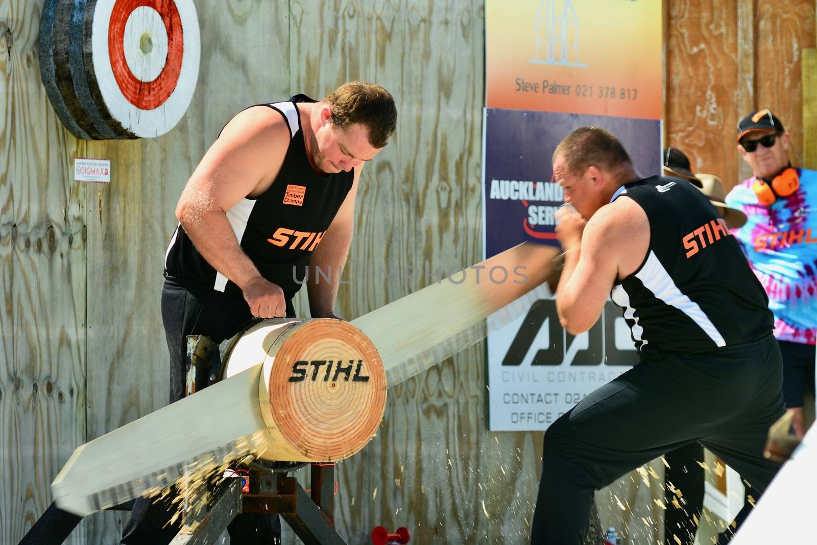 Kumeu, New Zealand - Mar 2020. 98th Annual Kumeu Show, International Timber Sports (the world Champion Axemen). Competition among renowned world axemen who came to New Zealand specifically for this event. by Marshalkina