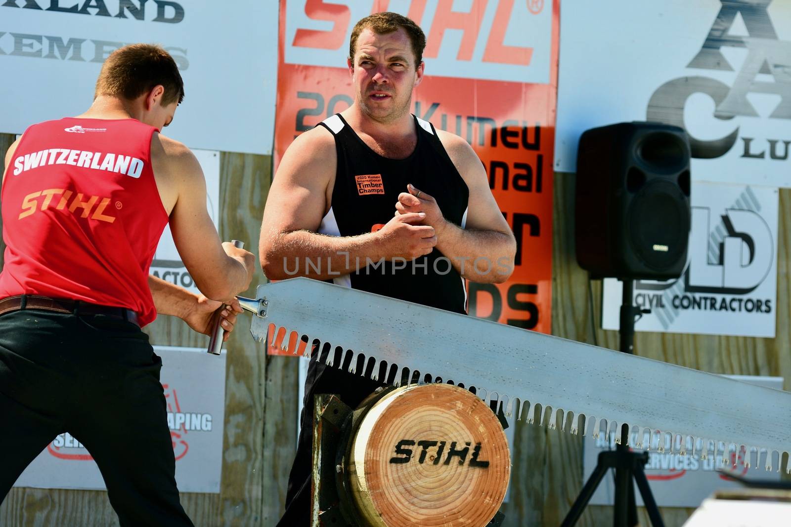 Kumeu, New Zealand - Mar 2020. 98th Annual Kumeu Show, International Timber Sports (the world Champion Axemen). Competition among renowned world axemen who came to New Zealand specifically for this event. by Marshalkina