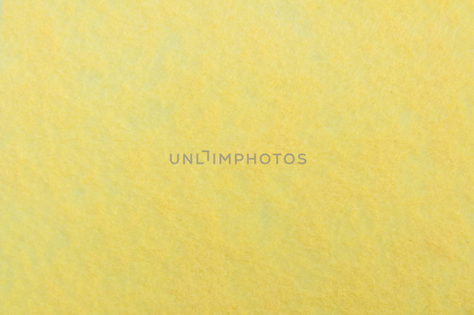Texture background of Yellow velvet or flannel as backdrop or wallpaper pattern for decoration