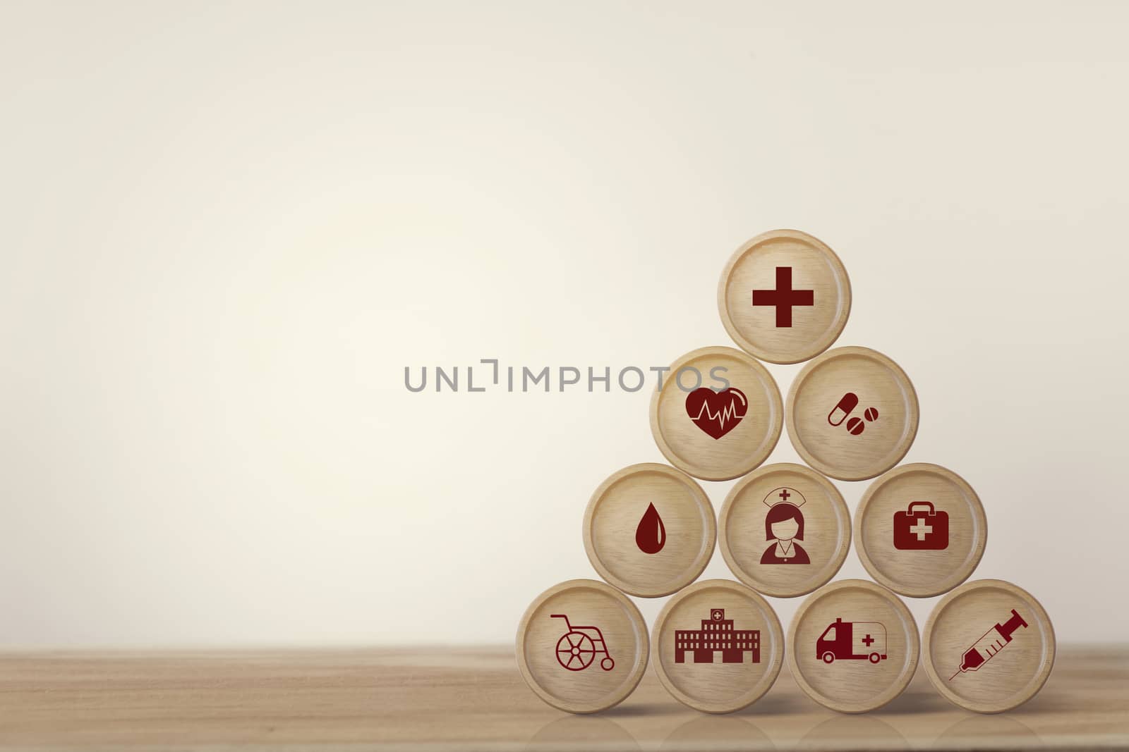 Healthcare concept about of health and medical insurance, Arranging block sphere stacking with icon health care medical on table wooden background.