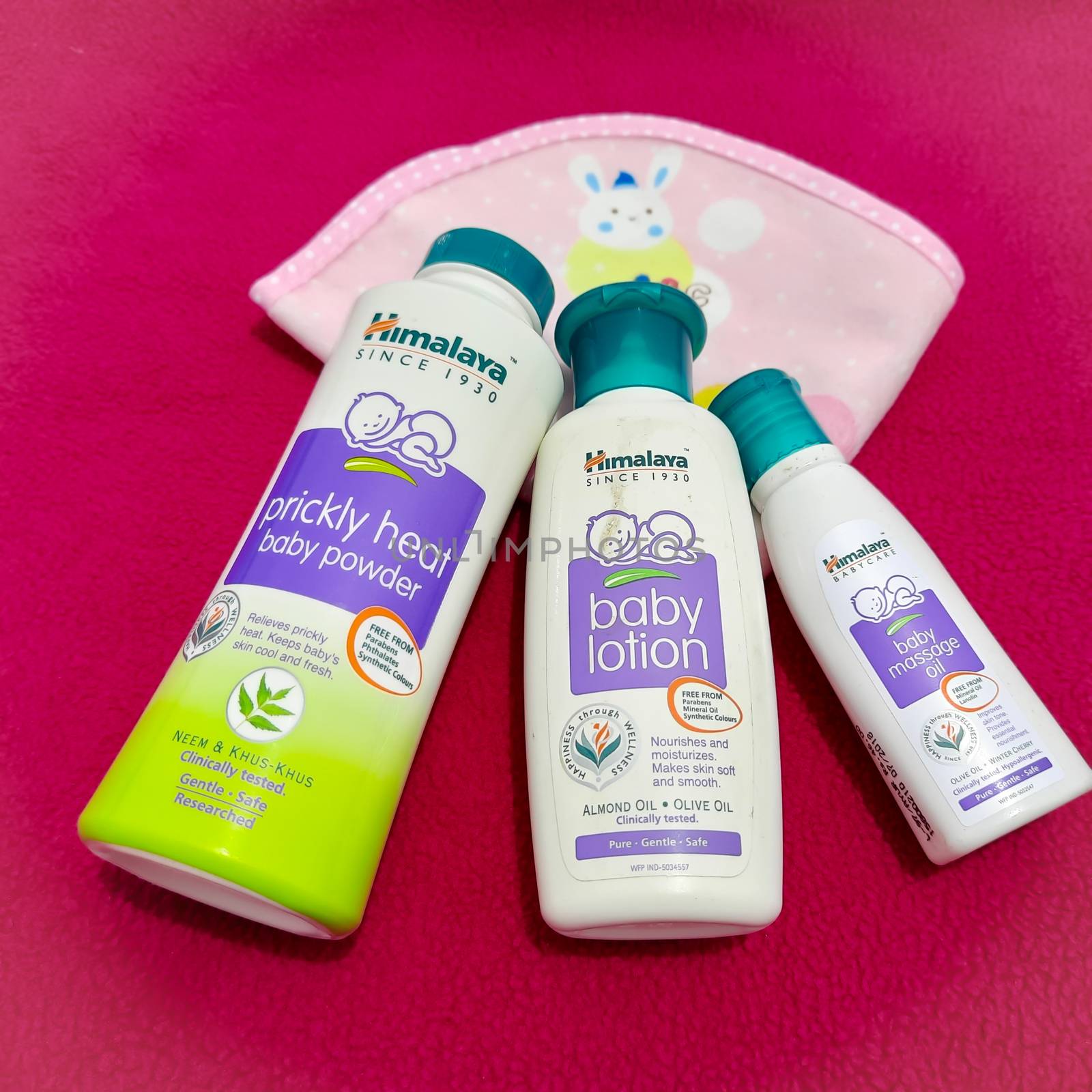 Chennai, India - July 4 2020: Baby Himalaya products placed beautifully in dark pink background and for smooth and soft skin
