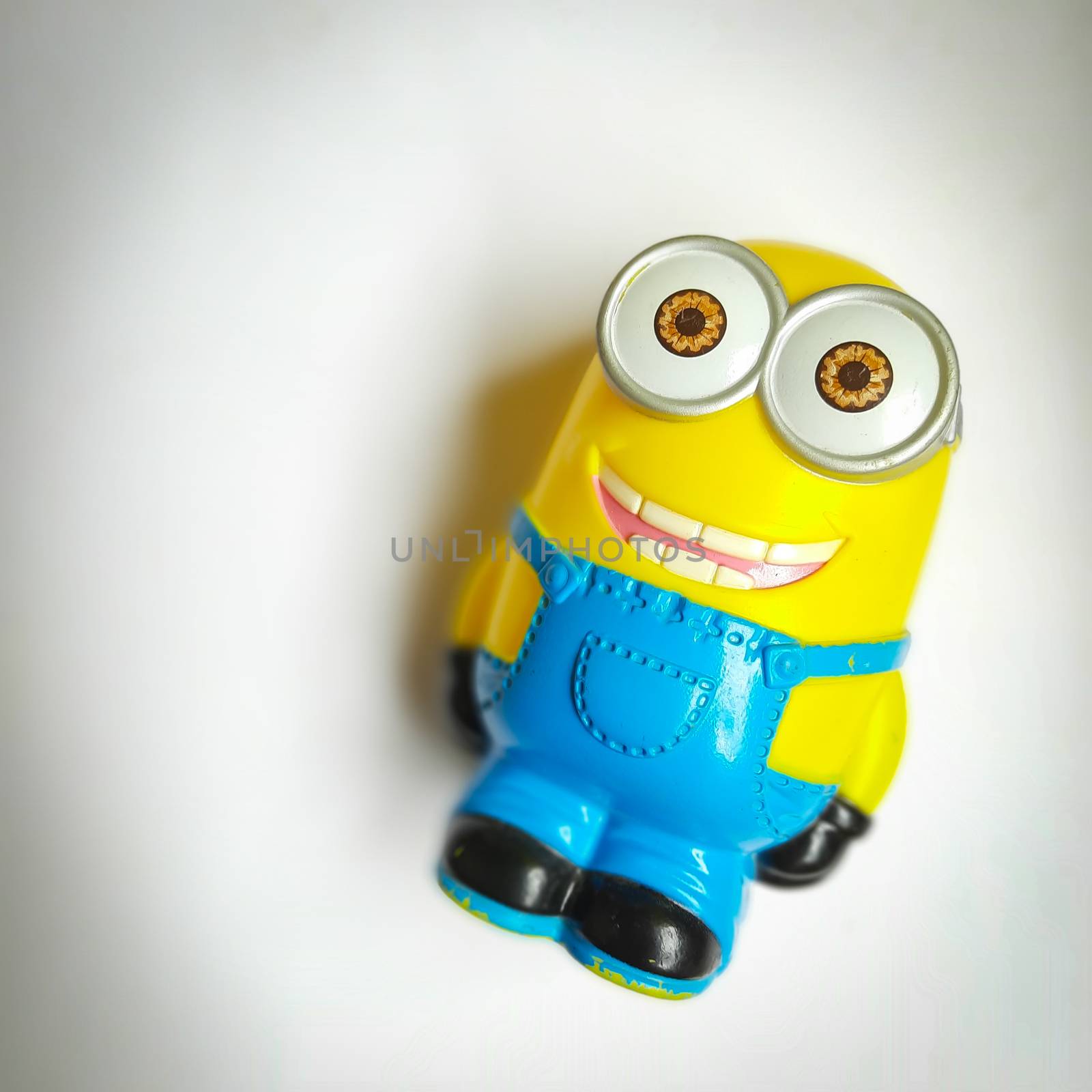 Chennai, India - July 2 2020: Minion toy shape piggy bank placed in white background