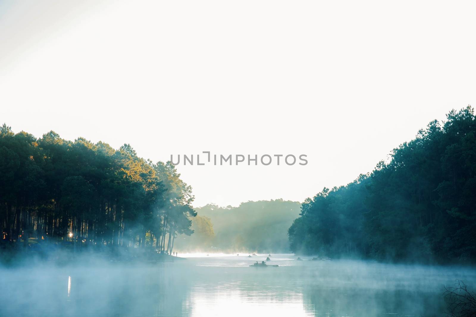 Mist in the morning with sunrise at Pang Oung reservoir.