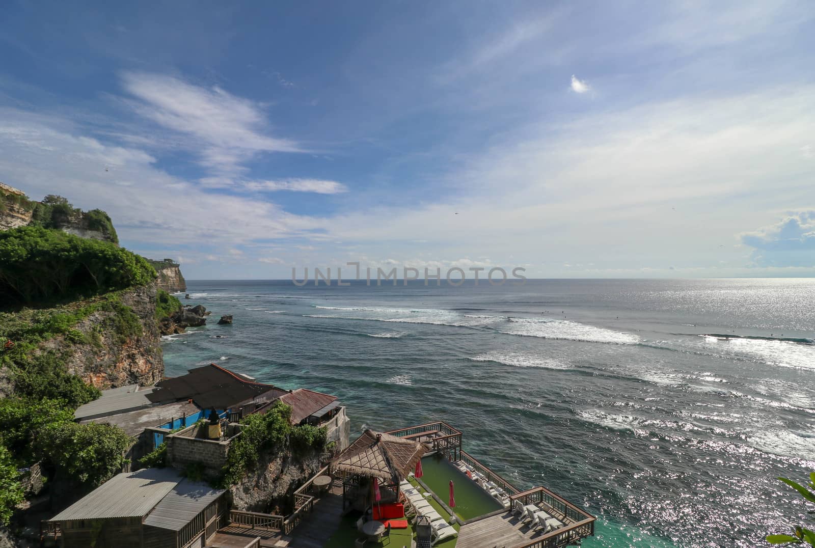 The Delpi Rock Lounge overlooking the ocean taken at Suluban Beach, Bali. Indonesia. This is a good place to view the sunset and a great surf spot.
