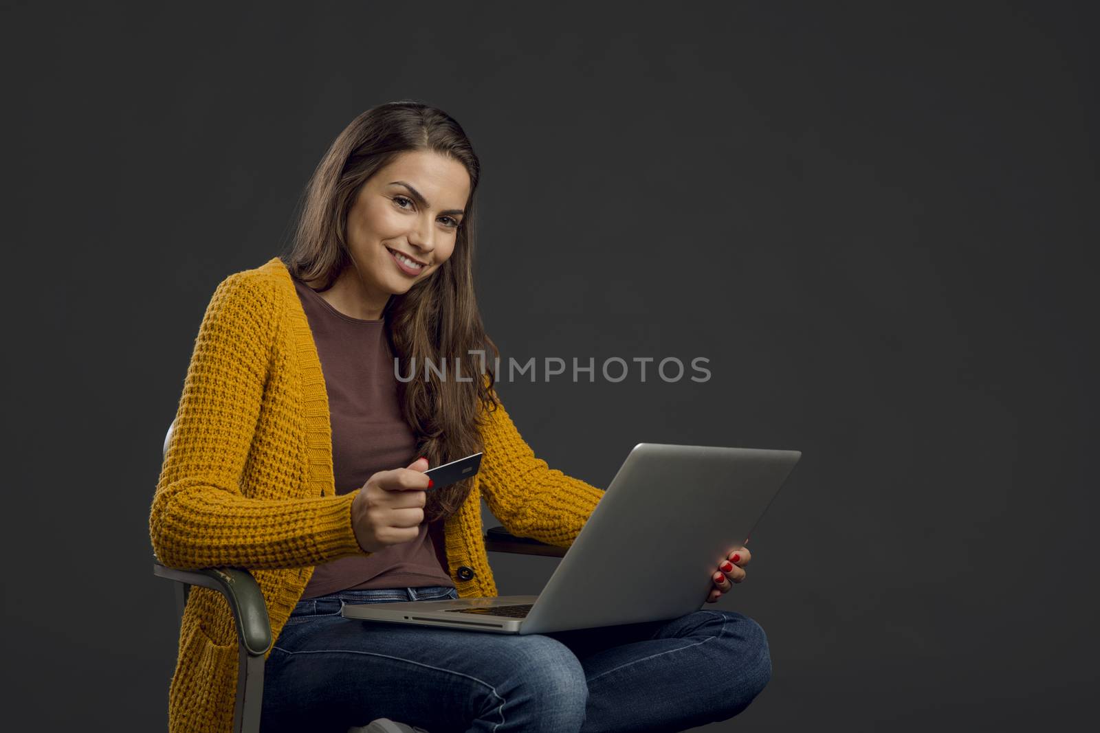 Beautiful woman doing some online shopping