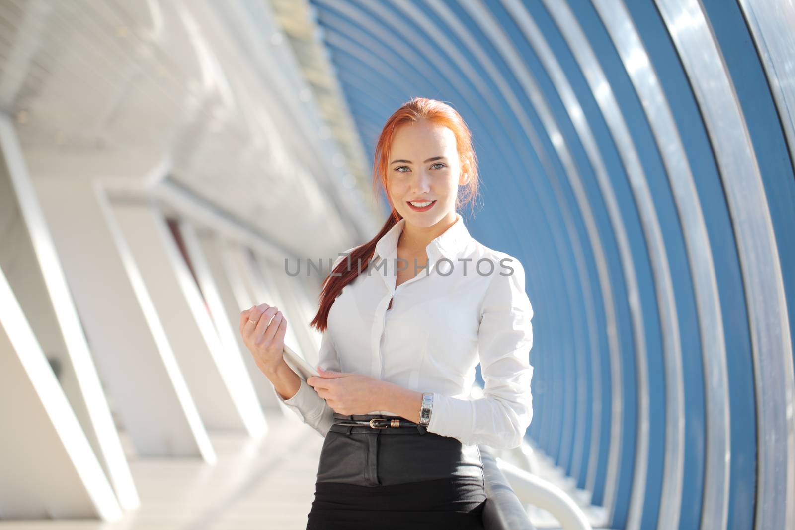 Businesswoman with tablet by ALotOfPeople