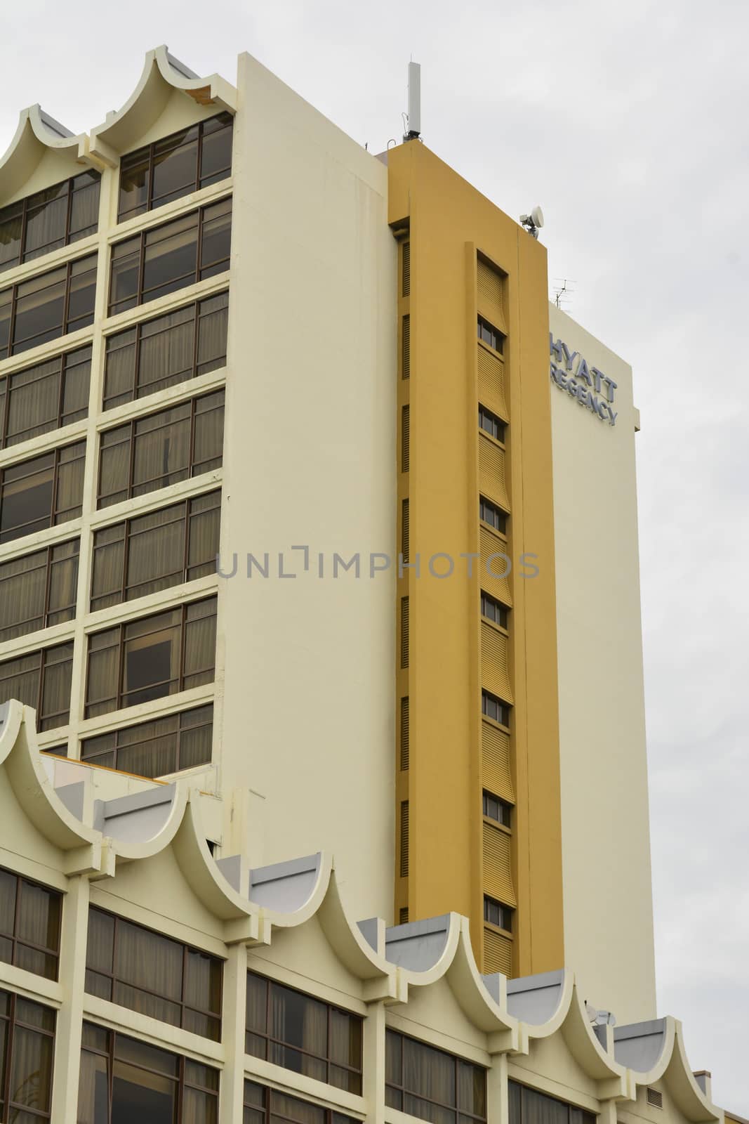 KOTA KINABALU, MY - JUNE 21: Hyatt Regency Kinabalu facade on June 21, 2016 in Malaysia. Hyatt Regency Kinabalu has 288 spacious hotel rooms and suites plus some of the best views in Kota Kinabalu.