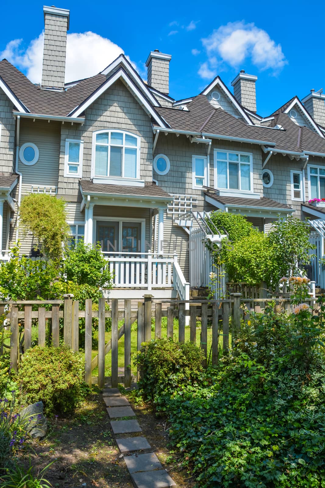 Residential townhouses on sunny day in Vancouver, British Columbia, Canada