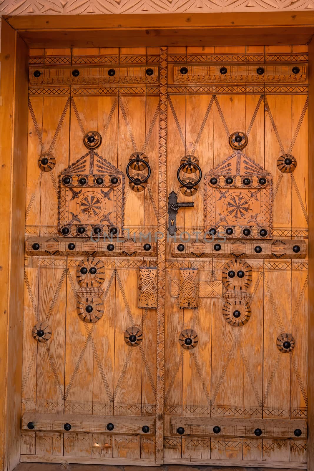 Handmade doors carved with the traditional Arab ornament, Ushaiqer Heritage Village, Saudi Arabia