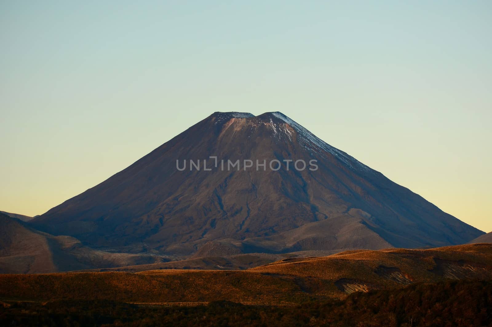 Symmetrial cone of a volcano (Mt Ngauruhoe) at Tongariro National Park, New Zealand. This is the largest and most active volcano of the Tongariro group, part of the Pacific Ring of Fire. by Marshalkina