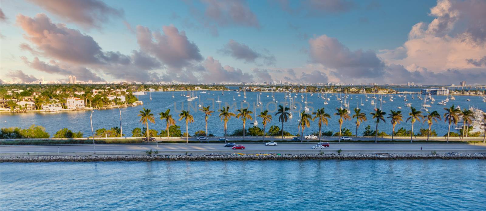 Sailboats Past Causeway Past Causeway and Harbor