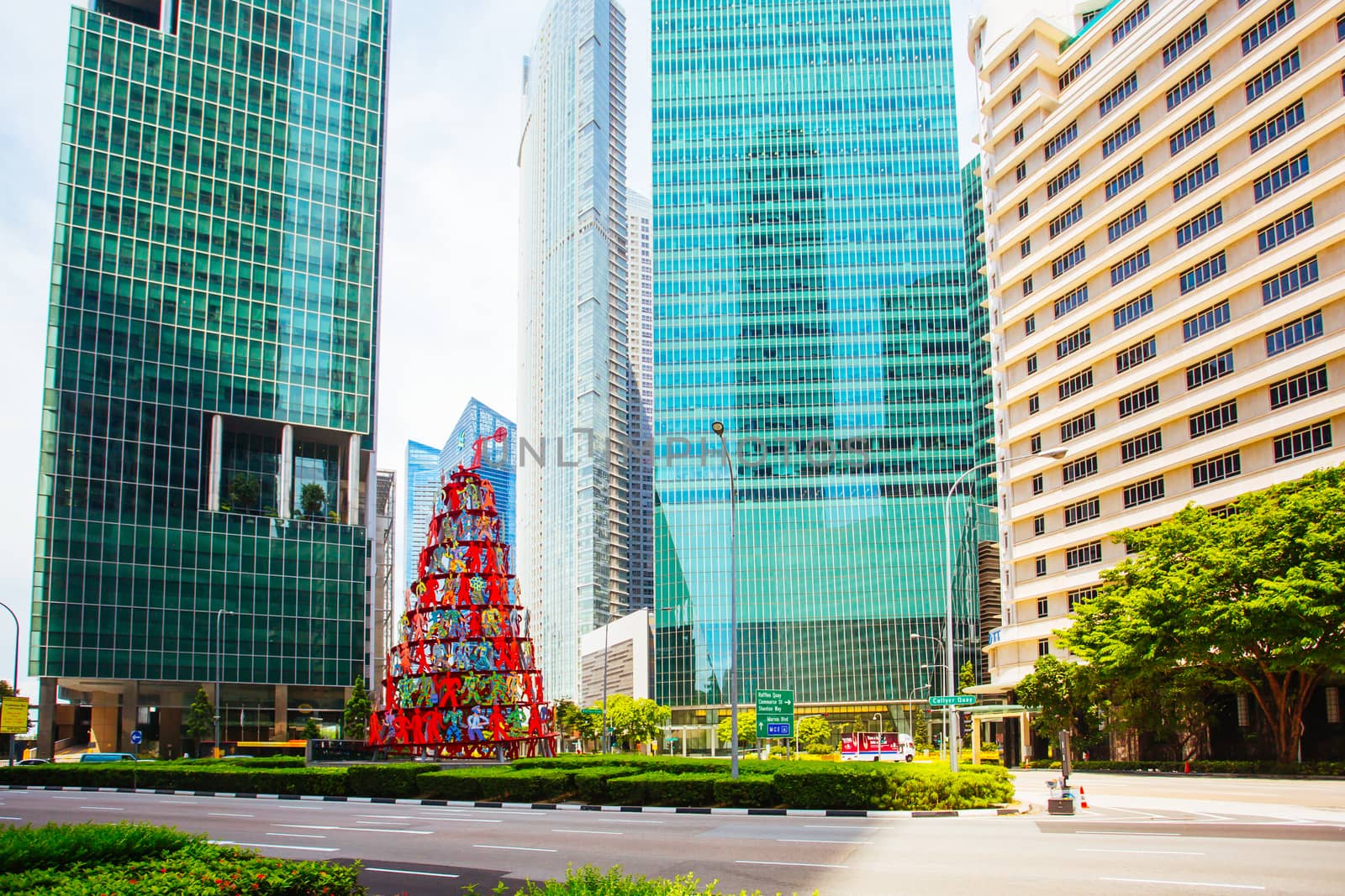 Singapore CBD, Singapore - June 21 2015: Singapore Momentum Sculpture located at the triangle traffic junction of Marina Blvd and Raffles Quay