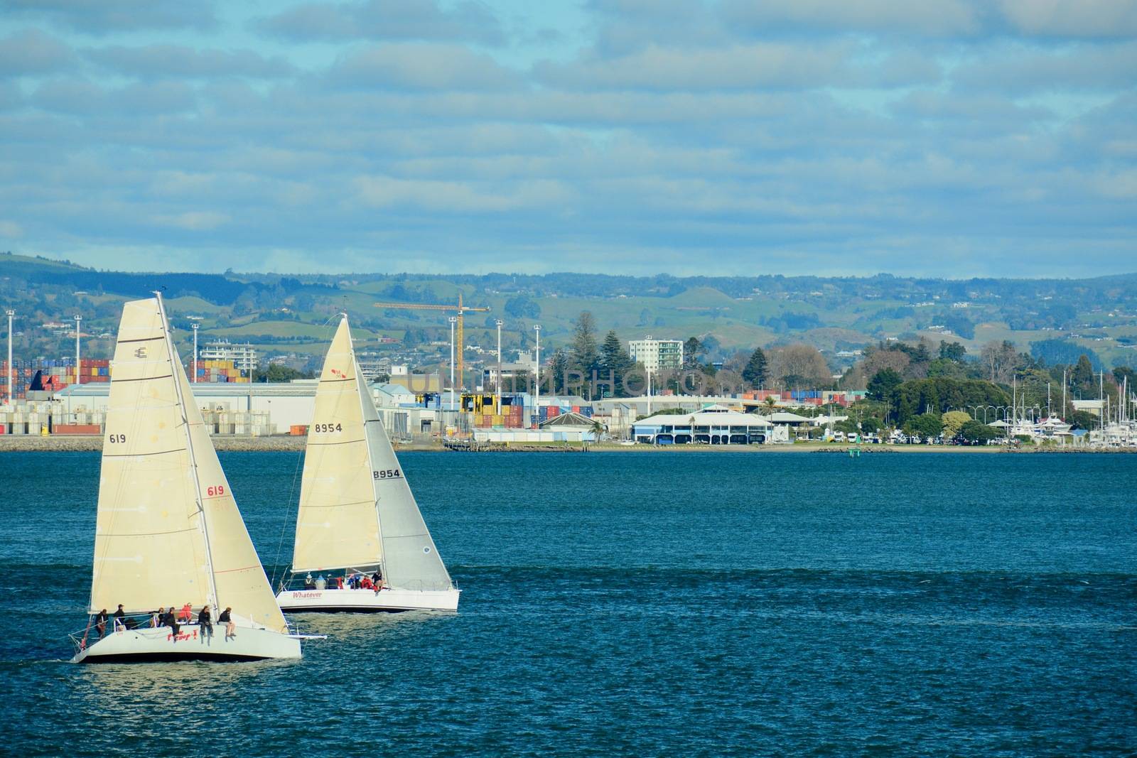 Papamoa Beach, Papamoa, New Zealand – July 07, 2019: Mount Maunganui Yacht Club with its enjoyable racing for all boats and crew. by Marshalkina