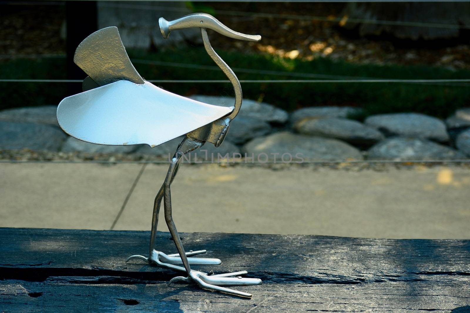 Modern sculpture; concept art; sculpture made of garden tools
