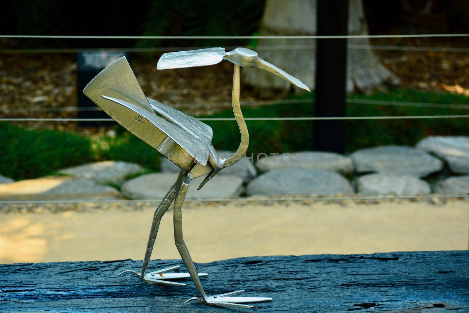 Modern sculpture; concept art; sculpture made of garden tools