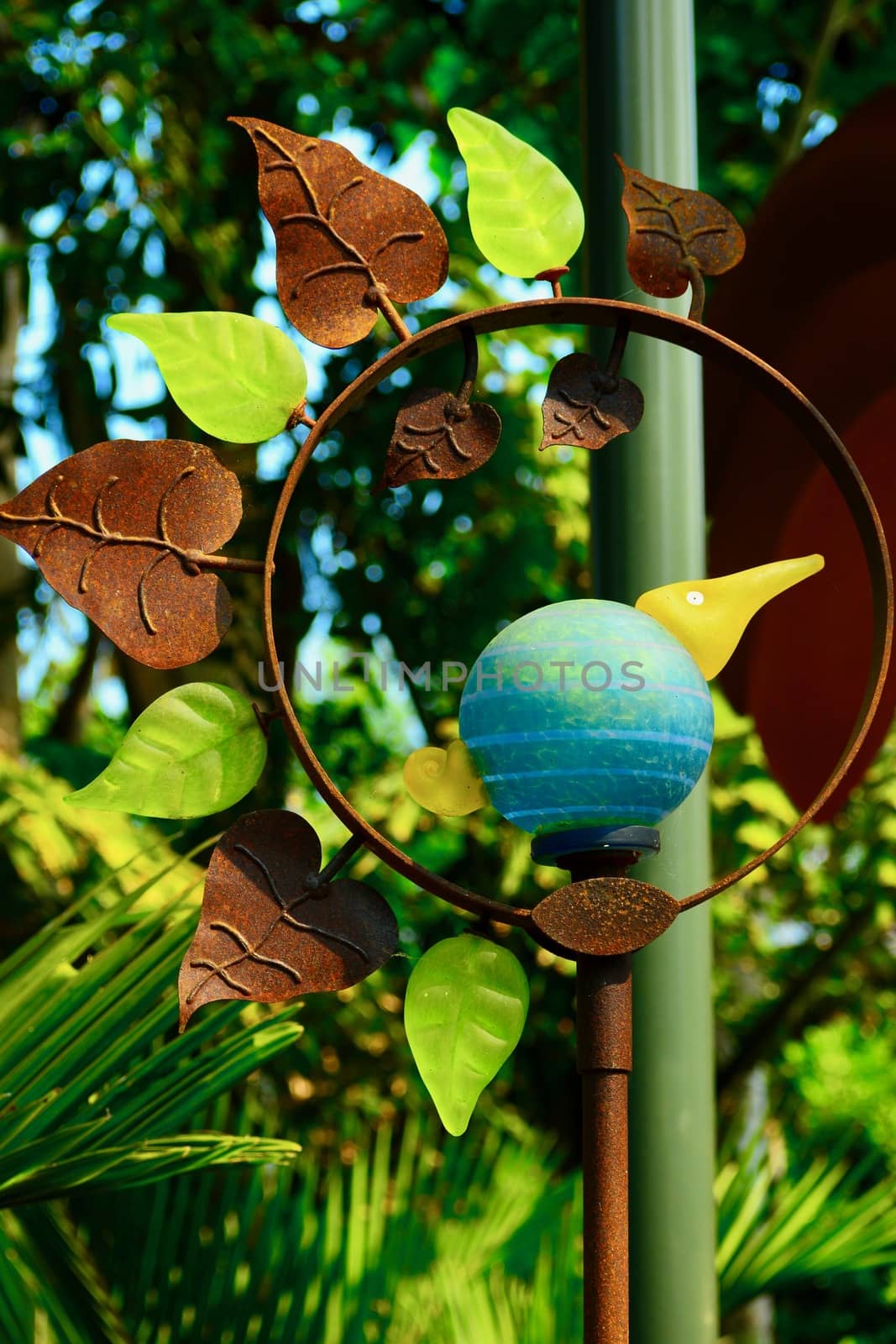 Garden sculpture, glass and metal, a glass bird
