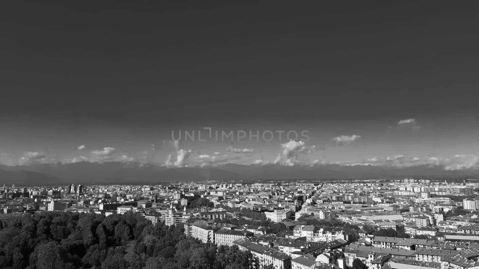 Turin, Italy - 07/02/2020: Travelling around North Italy. Beautiful caption of Turin wih sunny days and blue sky. Panoramic view to the city from Mole Antoneliana. Detailed photography of the old part