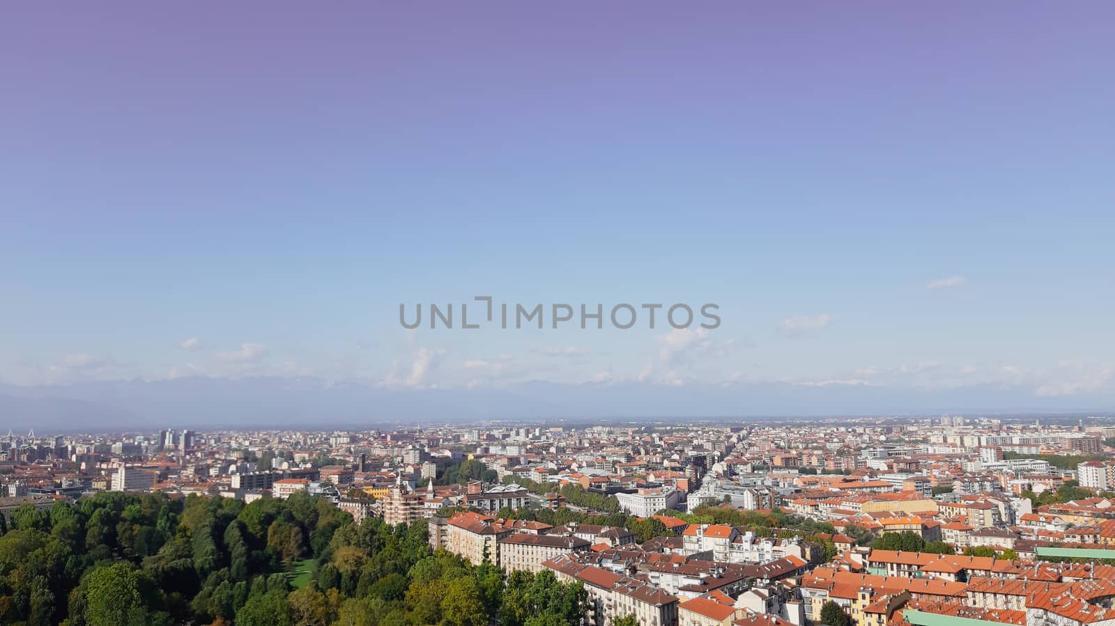 Turin, Italy - 07/02/2020: Travelling around North Italy. Beautiful caption of Turin wih sunny days and blue sky. Panoramic view to the city from Mole Antoneliana. Detailed photography of the old part